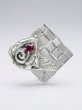 Checkered Background with Rose & Garnet Pendant